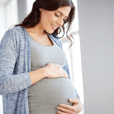 pregnant surrogate women in grey tshirt