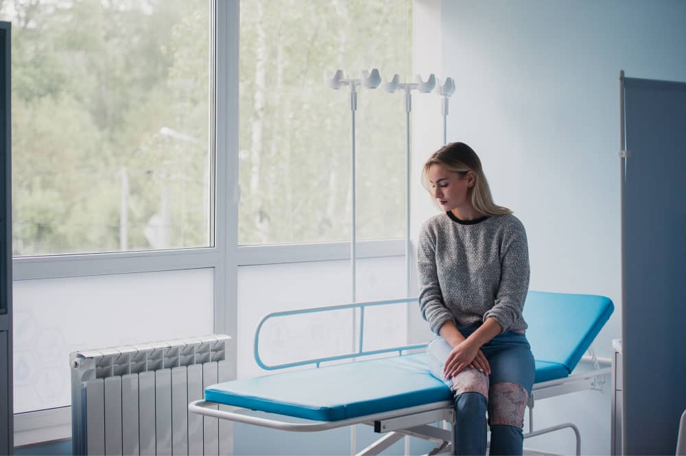woman-waiting-for-doctor-in-hospital-P3J7AGK